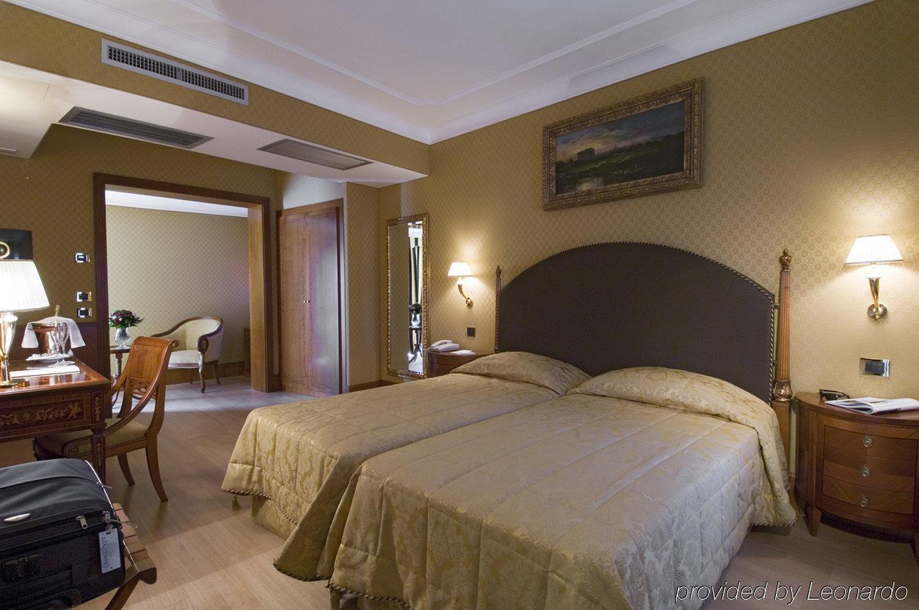 Hotel Homs Rom Rum bild